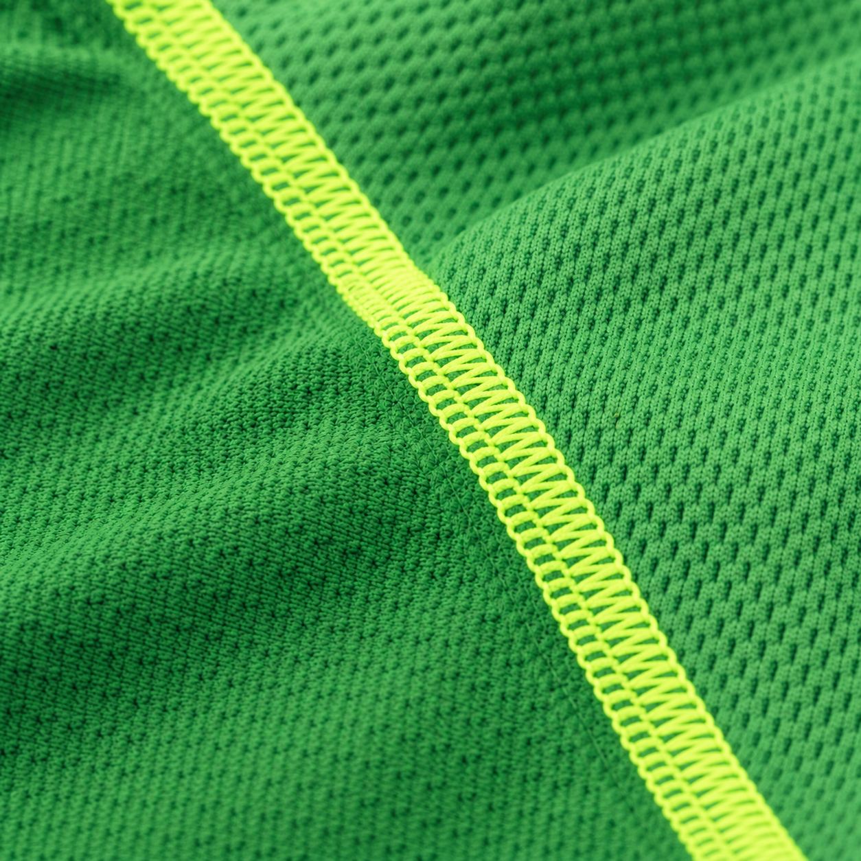 Macro of moisture-wicking knit fabric with flatlock seam